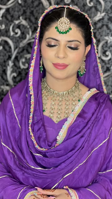 Bride in purple dupatta