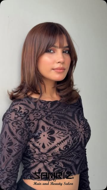 Layered cut with curtain bangs